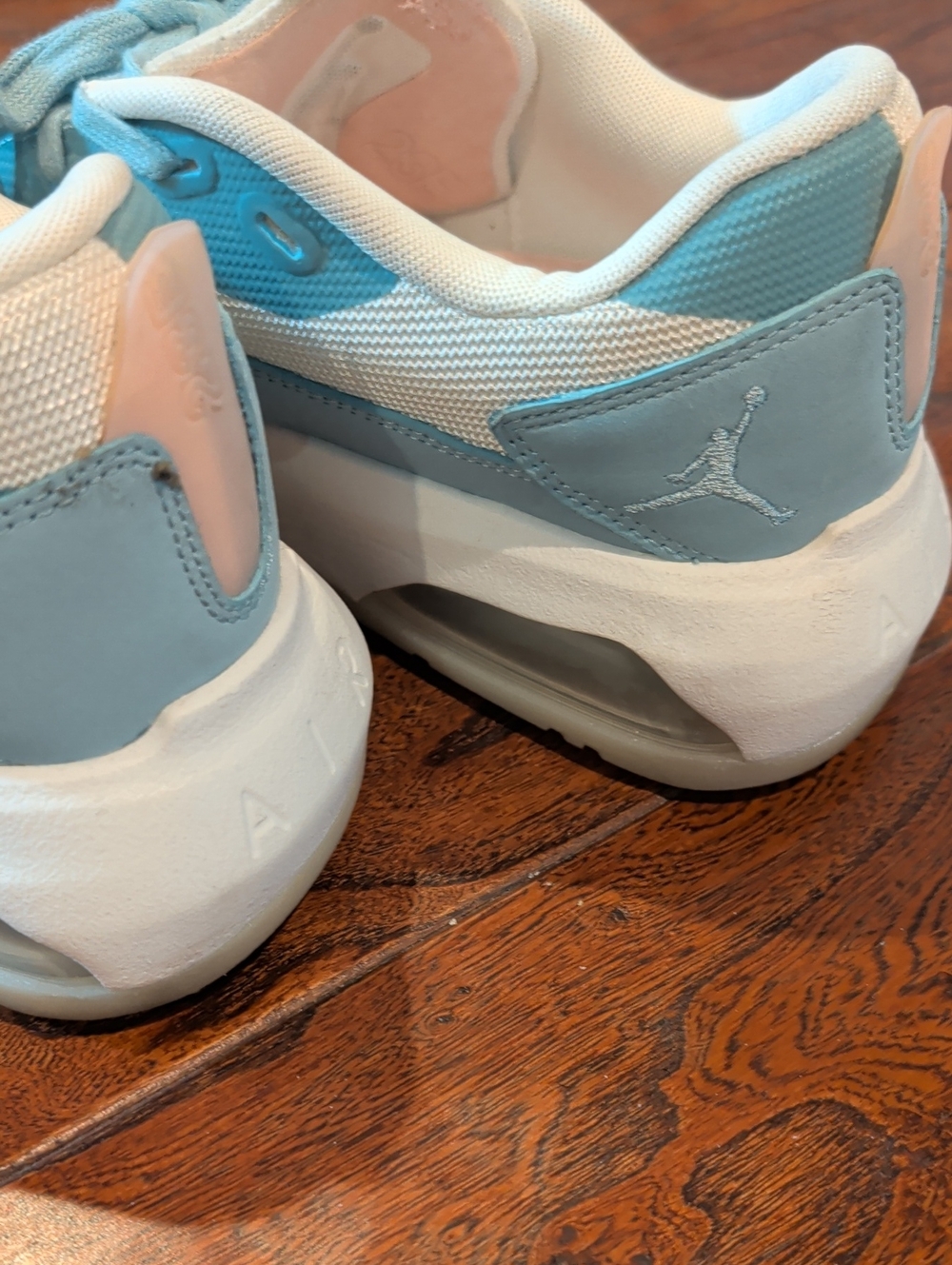 Jordan Women's Low-Top Athletic Sneakers in Light Blue, White, and Pale Pink